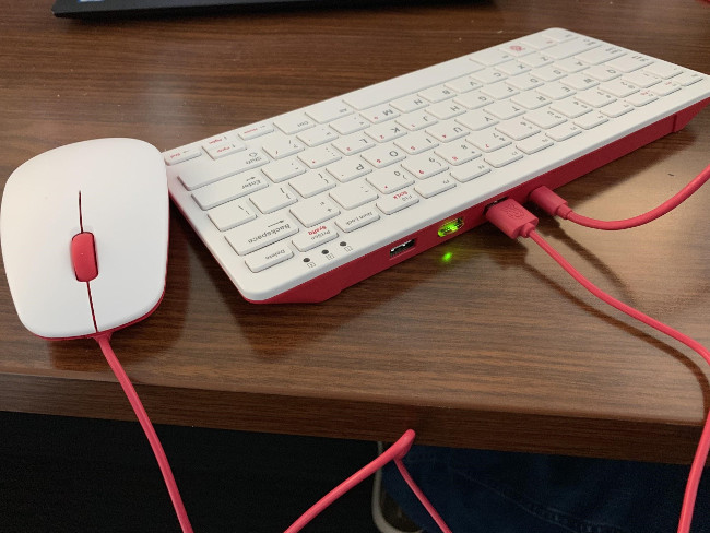 Official Raspberry Pi keyboard \(with YubiKey plugged in\) and mouse.